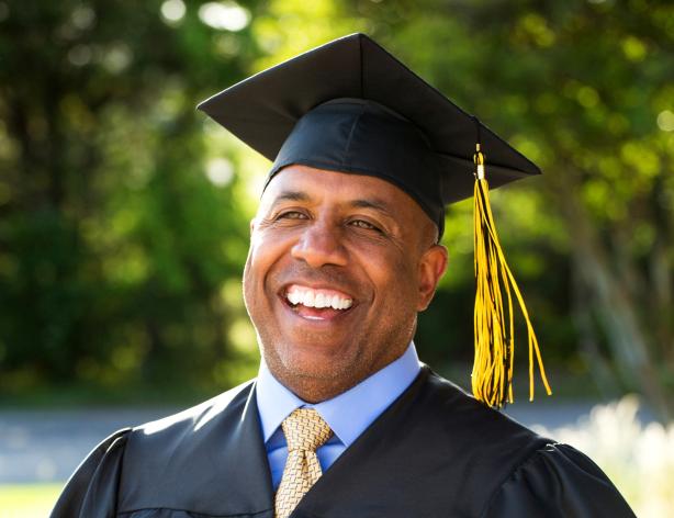 Man in a graduation cap and gown