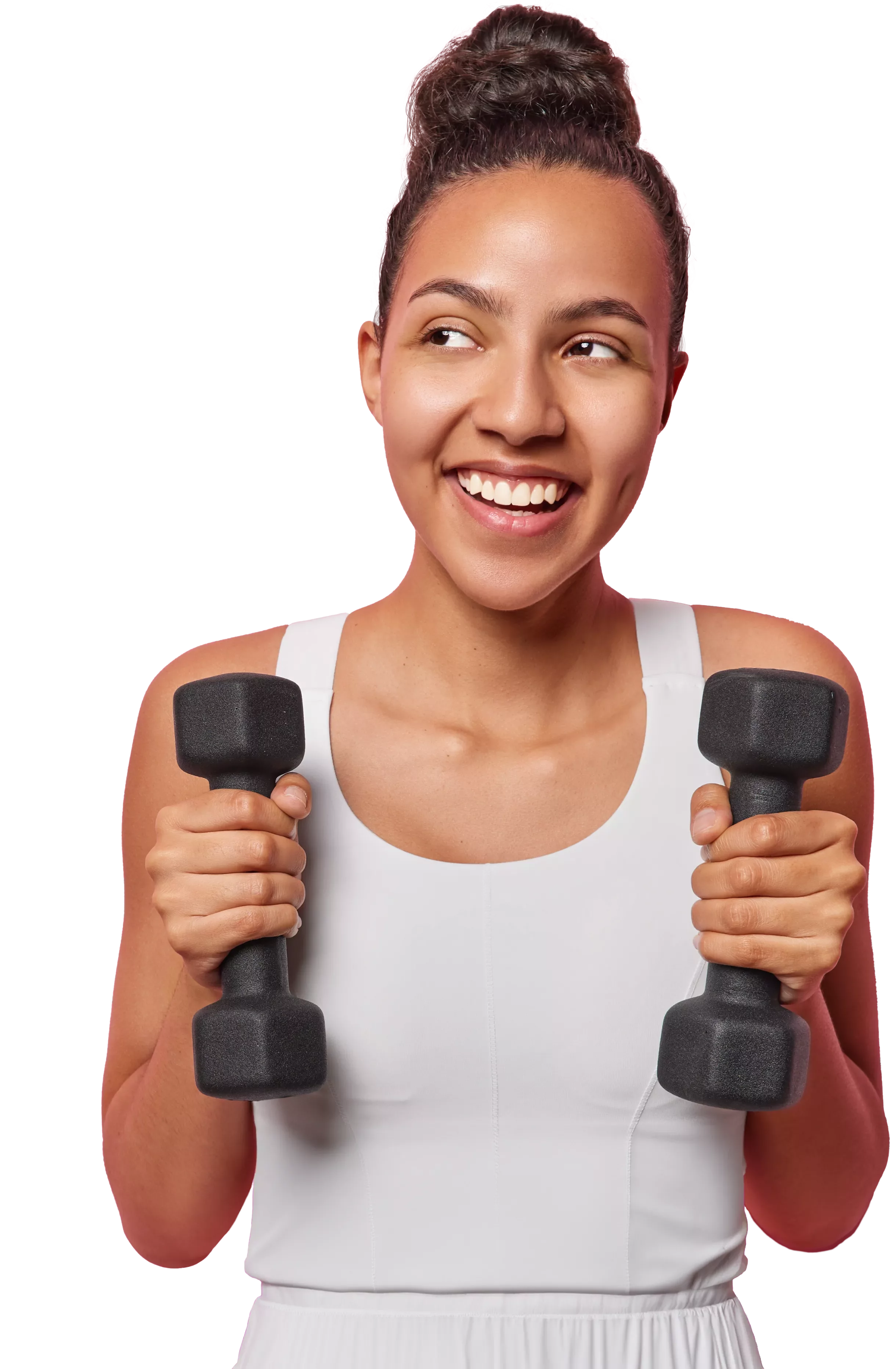 Woman in a white tank top smiling and holding two weights.